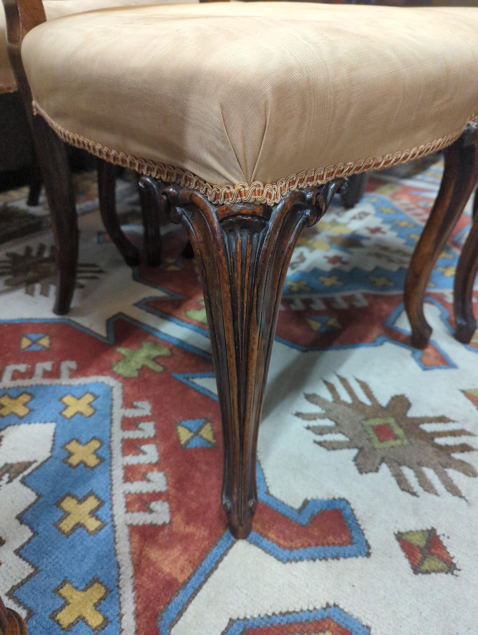 A set of four 19th century French Hepplewhite style rosewood dining chairs